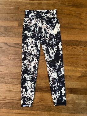 Roxy Girls' Black Floral Print Leggings with White and Pink Accents